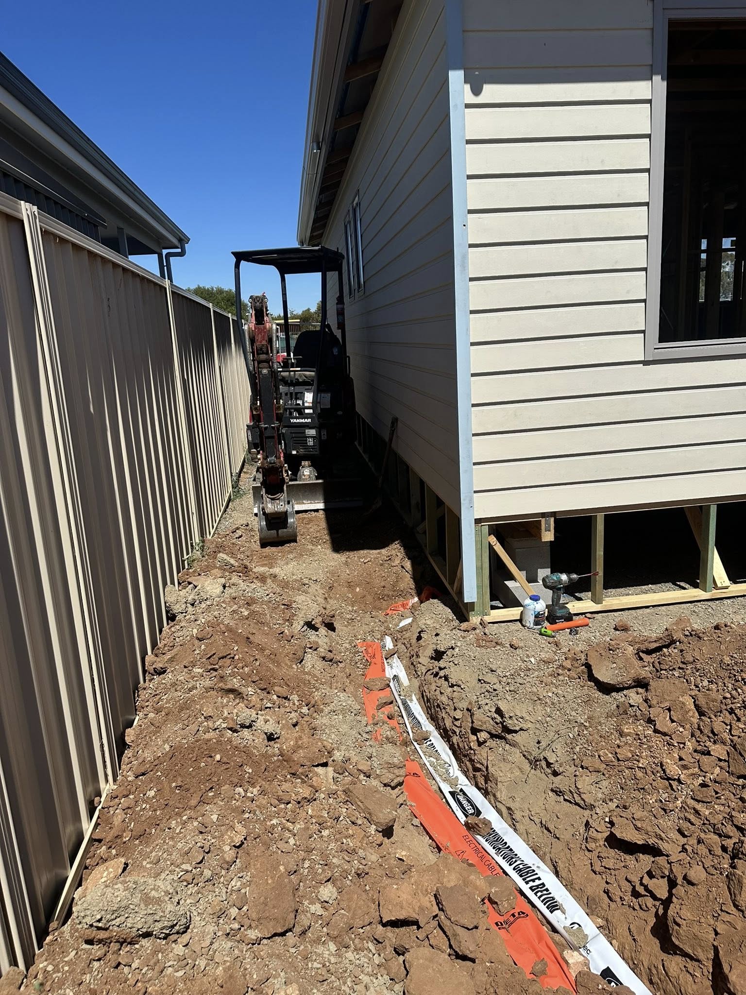 Mini excavator tight side access job SA