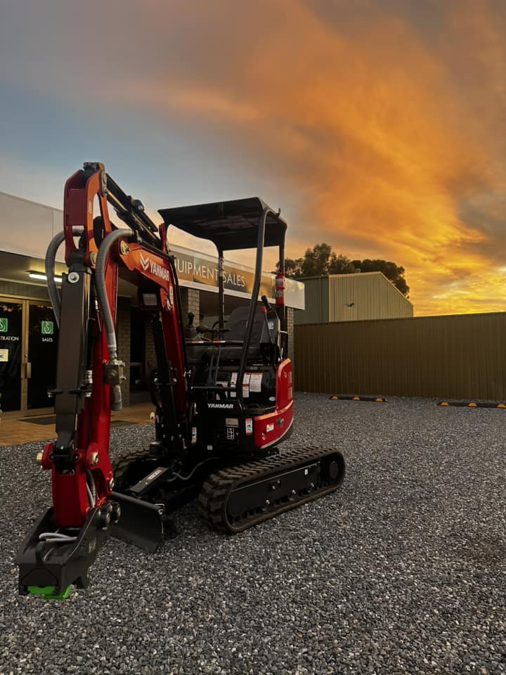 Burt's Hire 1.7T mini excavator at sunset — Adelaide SA